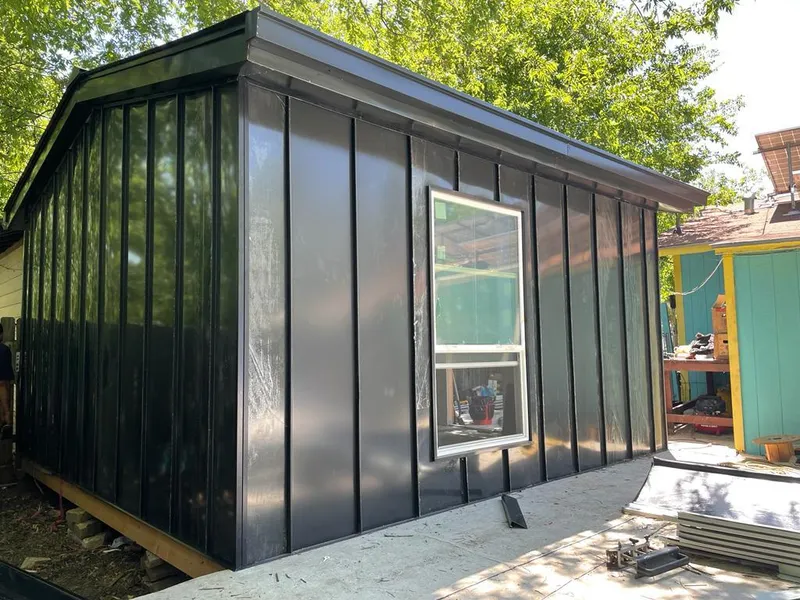 Black standing seam metal wall panels for Metal Roof Installation in Michigan City