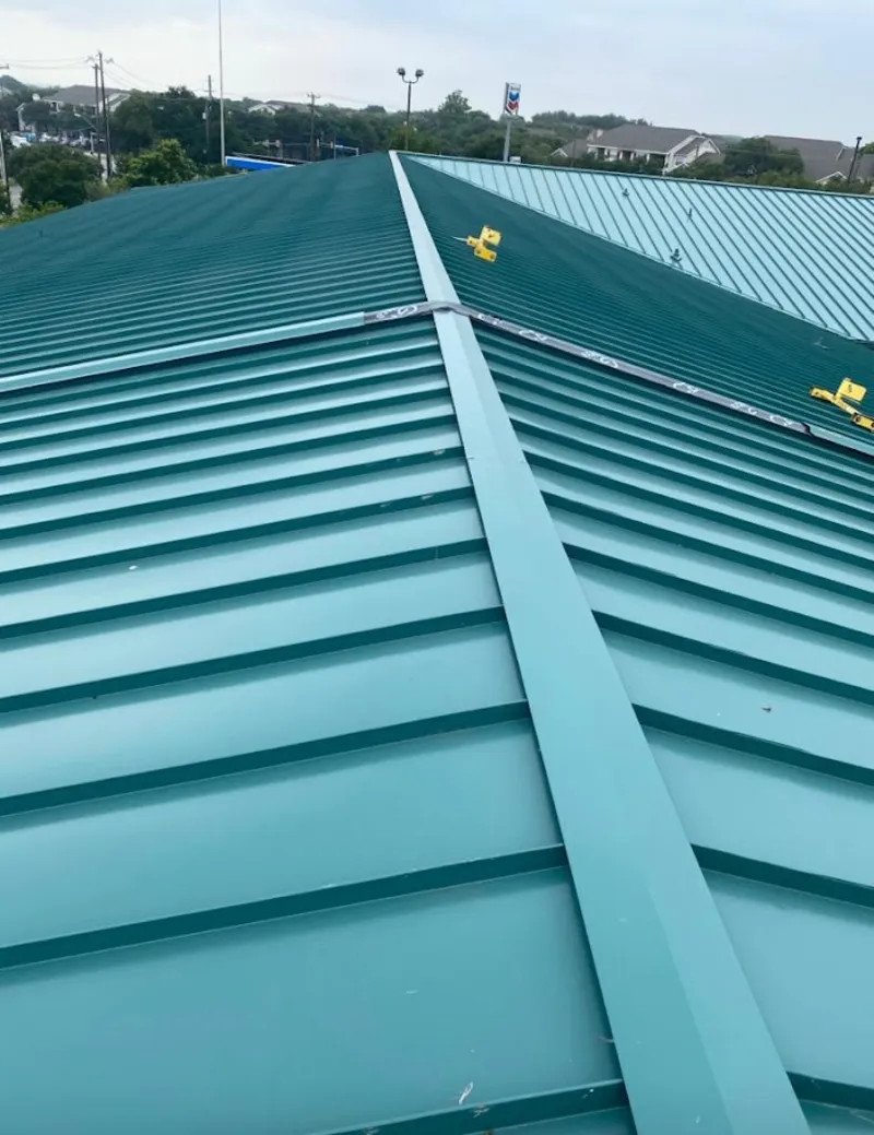 Green commercial metal roof ridge and valley for Metal Roof Repair in Michigan City