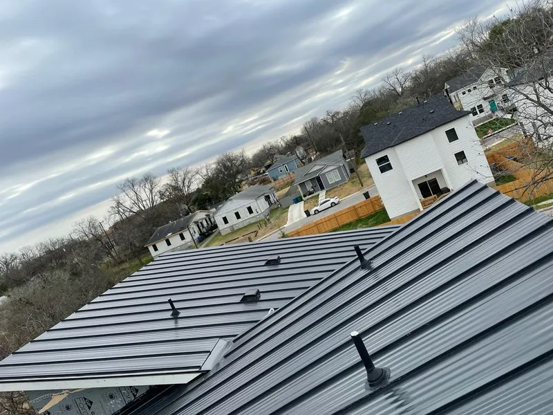 Standing seam metal roof panels with vents for Skylight Repair in Michigan City